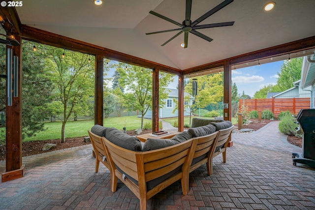 view of patio / terrace featuring an outdoor living space, ceiling fan, and a grill