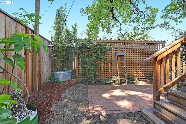 9115 N Richmond Ave, Portland, OR 97203 - fenced backyard with a patio