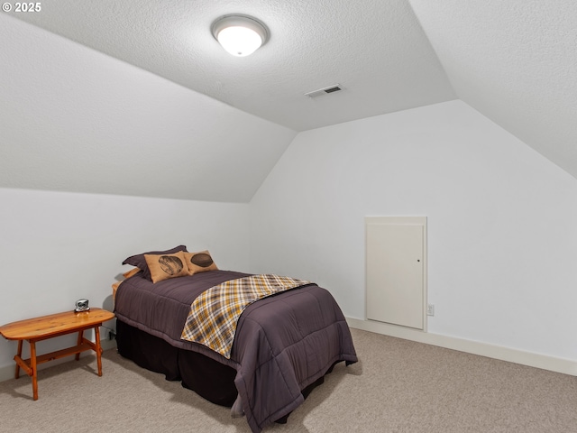 21800 S Green Mountain Rd, Colton, OR 97017 - bedroom with vaulted ceiling, light carpet, and a textured ceiling
