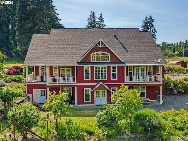 21800 S Green Mountain Rd, Colton, OR 97017 - view of front of property with french doors, a patio, a shingled roof, and a balcony