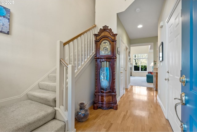 foyer entrance with light wood-type flooring