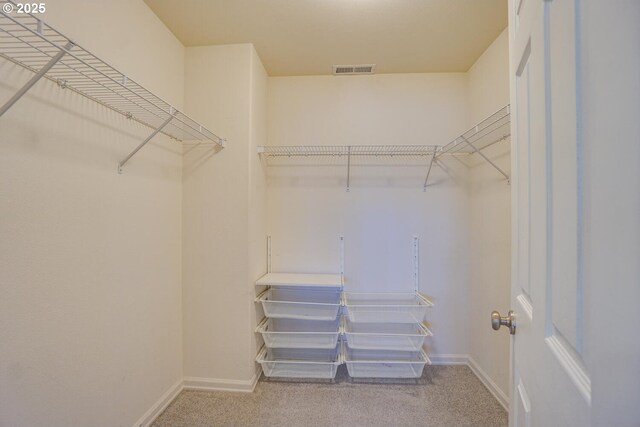 2301 NW 15th St, Battle Ground, WA 98604 - walk in closet featuring carpet floors and visible vents