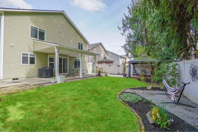 2301 NW 15th St, Battle Ground, WA 98604 - back of house with a yard, a fenced backyard, a gazebo, and a patio