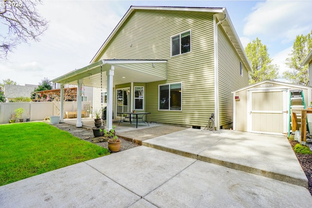 2301 NW 15th St, Battle Ground, WA 98604 - rear view of property featuring a shed, a patio area, a yard, fence, and an outdoor structure