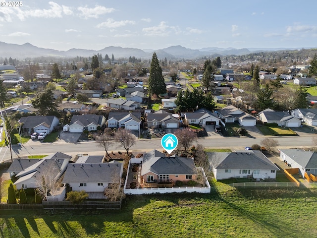 bird's eye view featuring a residential view and a mountain view