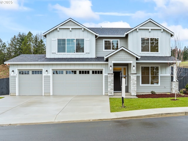 view of front facade featuring board and batten siding, roof with shingles, driveway, and an attached garage