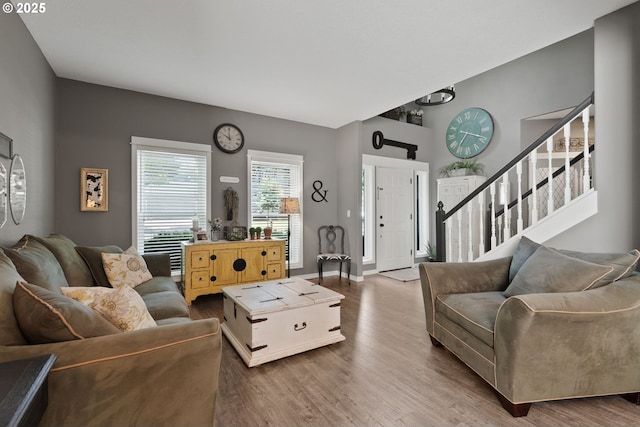 8775 SW Comanche Way, Tualatin, OR 97062 - living area with wood finished floors and stairway