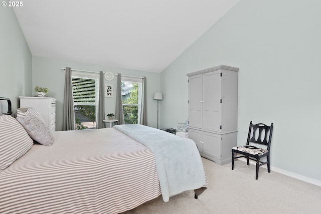 8775 SW Comanche Way, Tualatin, OR 97062 - bedroom featuring light carpet and vaulted ceiling