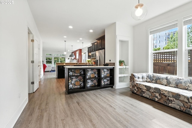 18 NE Cook St, Portland, OR 97212 - living area with wood finished floors and recessed lighting