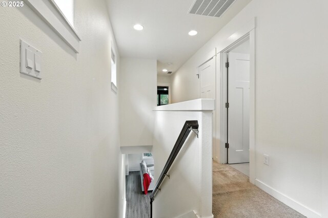 18 NE Cook St, Portland, OR 97212 - corridor featuring light colored carpet, an upstairs landing, and recessed lighting