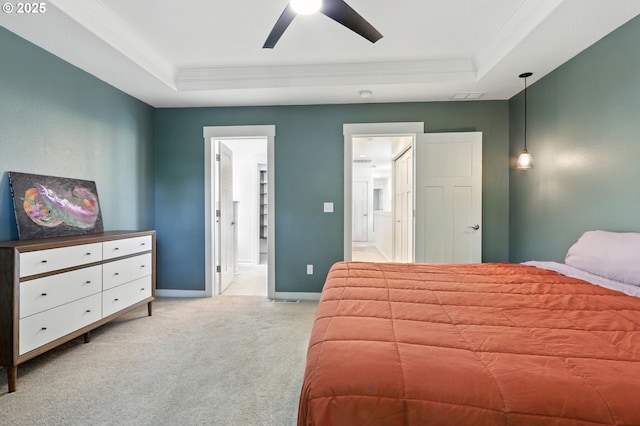 18 NE Cook St, Portland, OR 97212 - bedroom featuring a tray ceiling, crown molding, light colored carpet, ensuite bathroom, and a ceiling fan