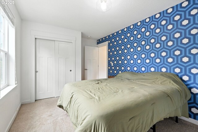 18 NE Cook St, Portland, OR 97212 - carpeted bedroom with multiple windows and a closet