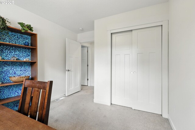 18 NE Cook St, Portland, OR 97212 - carpeted bedroom featuring baseboards and a closet