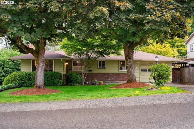 9004 SW 36th Ave, Portland, OR 97219 - ranch-style home featuring an attached garage, brick siding, and asphalt driveway