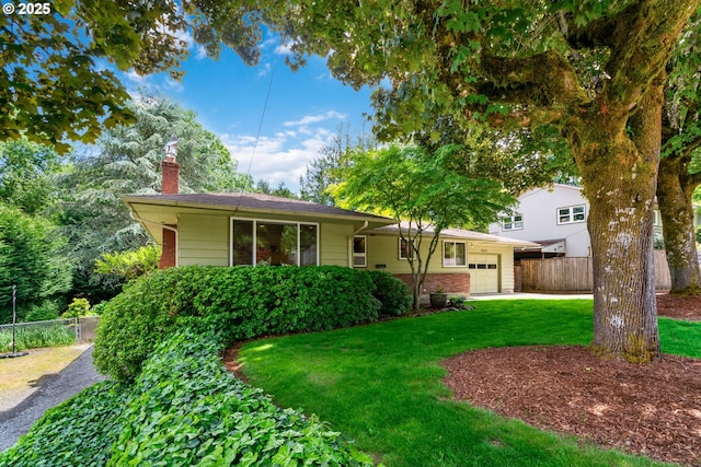 9004 SW 36th Ave, Portland, OR 97219 - single story home featuring a chimney, a garage, and brick siding