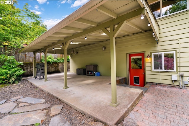 9004 SW 36th Ave, Portland, OR 97219 - view of patio featuring an attached carport