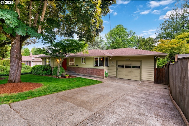 9004 SW 36th Ave, Portland, OR 97219 - ranch-style home with an attached garage, concrete driveway, and brick siding