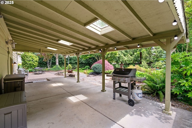 9004 SW 36th Ave, Portland, OR 97219 - view of patio featuring a grill and outdoor dining space