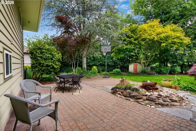 9004 SW 36th Ave, Portland, OR 97219 - view of patio / terrace featuring outdoor dining area and an outdoor fire pit