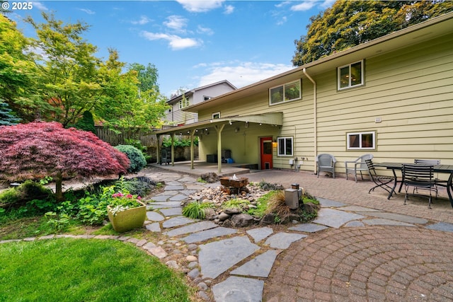 9004 SW 36th Ave, Portland, OR 97219 - back of property with a patio area and a fire pit