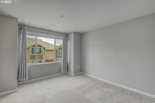 8800 SW 147th Ter Unit 103, Beaverton, OR 97007 - carpeted spare room featuring baseboards