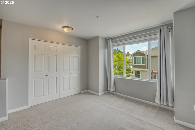 8800 SW 147th Ter Unit 103, Beaverton, OR 97007 - unfurnished bedroom with carpet floors and a closet