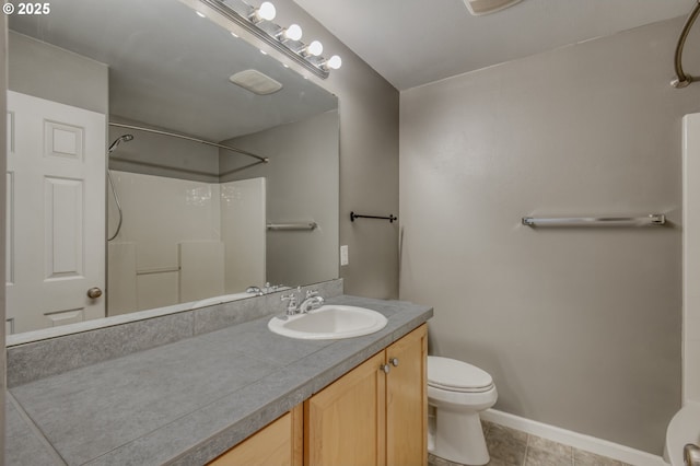 8800 SW 147th Ter Unit 103, Beaverton, OR 97007 - bathroom featuring a shower, vanity, and tile patterned floors