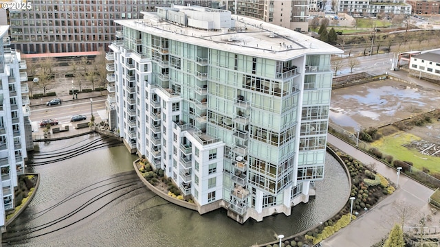 birds eye view of property with a city view