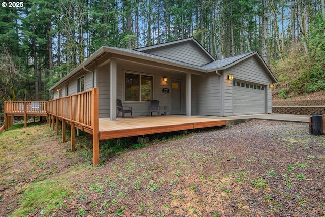 view of front of property featuring driveway and an attached garage