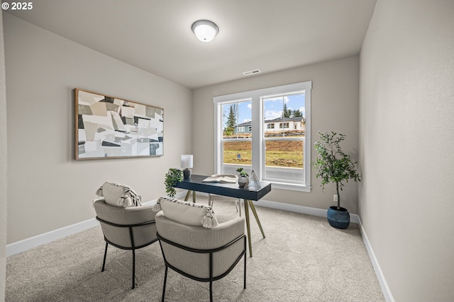 office featuring visible vents, carpet, and baseboards