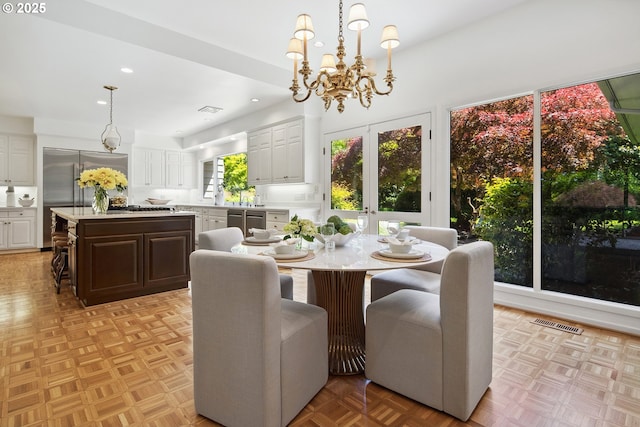 1890 S Greenwood Rd, Portland, OR 97219 - dining area with a chandelier and recessed lighting