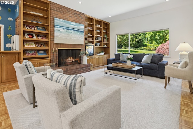 1890 S Greenwood Rd, Portland, OR 97219 - living room featuring a fireplace, built in shelves, and recessed lighting
