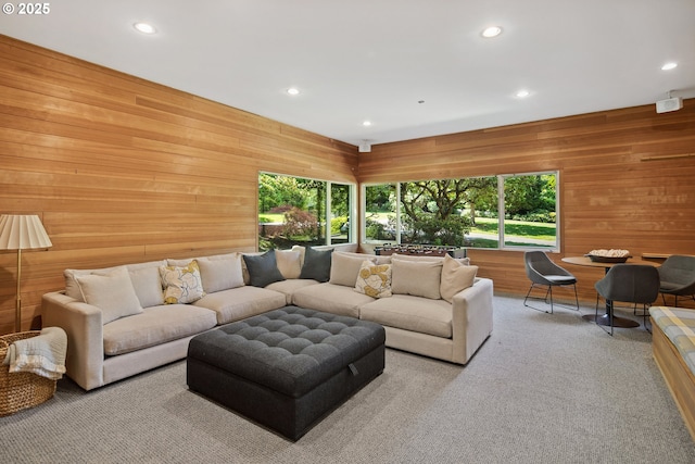 1890 S Greenwood Rd, Portland, OR 97219 - carpeted living room with recessed lighting and wood walls