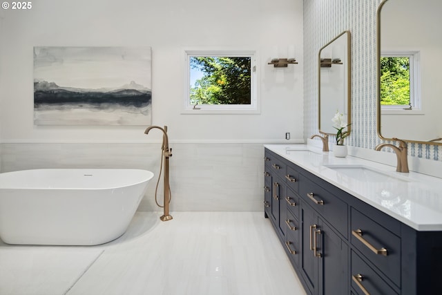 1890 S Greenwood Rd, Portland, OR 97219 - full bath featuring double vanity, a freestanding tub, and wainscoting