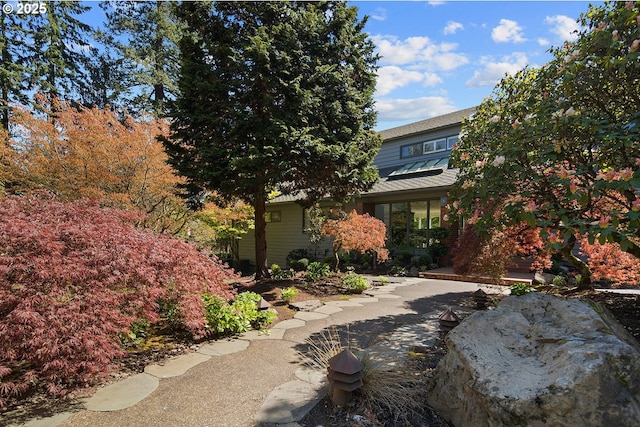1890 S Greenwood Rd, Portland, OR 97219 - view of front of home featuring metal roof and a standing seam roof