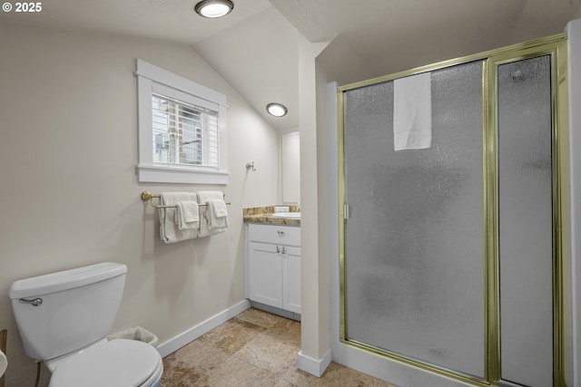 full bath featuring a stall shower, baseboards, vanity, and toilet