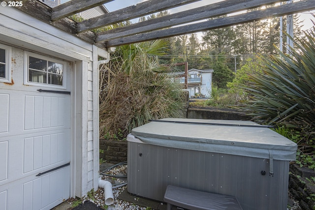 details with a hot tub and a skylight