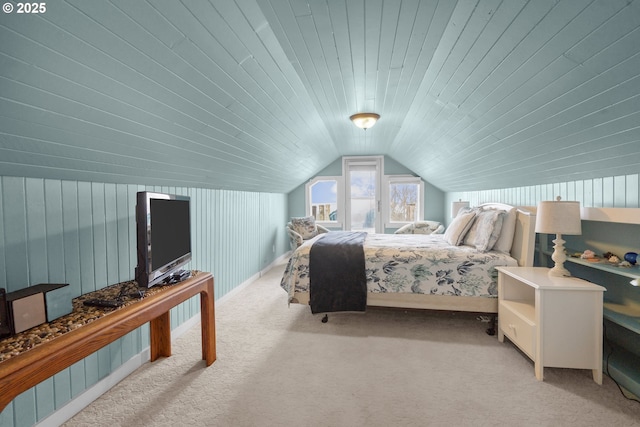 carpeted bedroom with wood ceiling and lofted ceiling