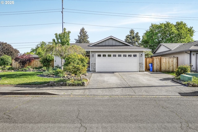 ranch-style home with concrete driveway, stone siding, and an attached garage