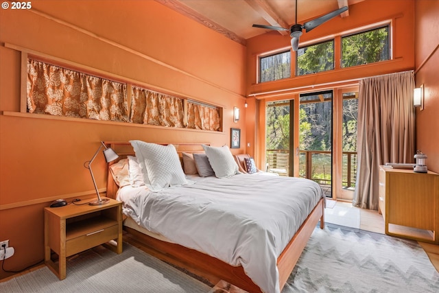49348 Mckenzie Hwy, Vida, OR 97488 - bedroom featuring access to exterior, multiple windows, and a towering ceiling