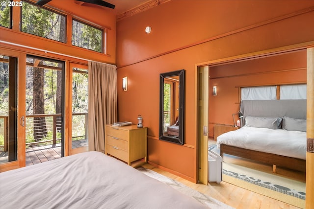 49348 Mckenzie Hwy, Vida, OR 97488 - bedroom featuring wood finished floors and a high ceiling