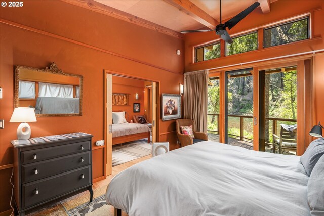 49348 Mckenzie Hwy, Vida, OR 97488 - bedroom featuring beamed ceiling, multiple windows, and a towering ceiling