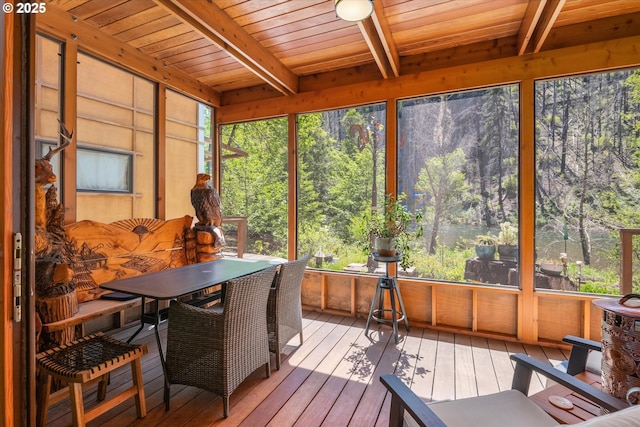 49348 Mckenzie Hwy, Vida, OR 97488 - sunroom / solarium featuring beam ceiling and outdoor dining area