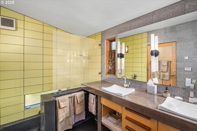 49348 Mckenzie Hwy, Vida, OR 97488 - bathroom with tile walls, double vanity, and backsplash