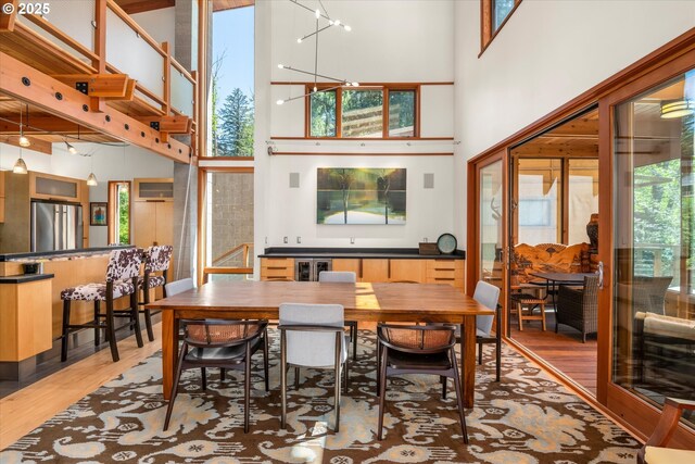 49348 Mckenzie Hwy, Vida, OR 97488 - dining space with light wood-type flooring and a towering ceiling