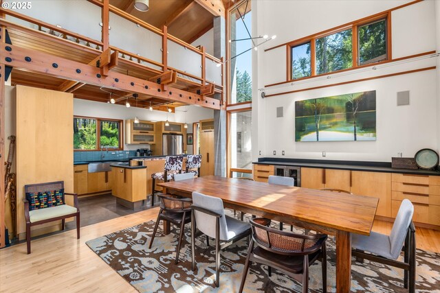 49348 Mckenzie Hwy, Vida, OR 97488 - dining space with light wood-style floors and a towering ceiling
