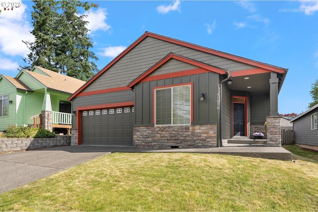 31070 NW Kaybern St, North Plains, OR 97133 - craftsman-style home featuring stone siding, board and batten siding, driveway, an attached garage, and a front lawn