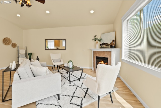 31070 NW Kaybern St, North Plains, OR 97133 - living room with healthy amount of natural light, a tile fireplace, light wood-type flooring, and recessed lighting