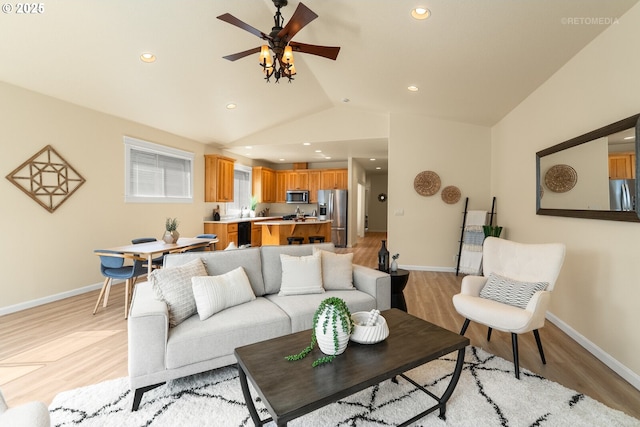 31070 NW Kaybern St, North Plains, OR 97133 - living room with a ceiling fan, light wood finished floors, lofted ceiling, and recessed lighting