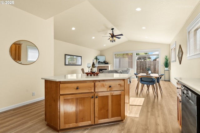 31070 NW Kaybern St, North Plains, OR 97133 - kitchen featuring dishwasher, vaulted ceiling, light wood-type flooring, ceiling fan, and light countertops